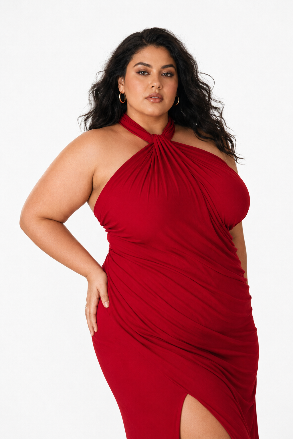 Plus-size model in a red draped evening dress